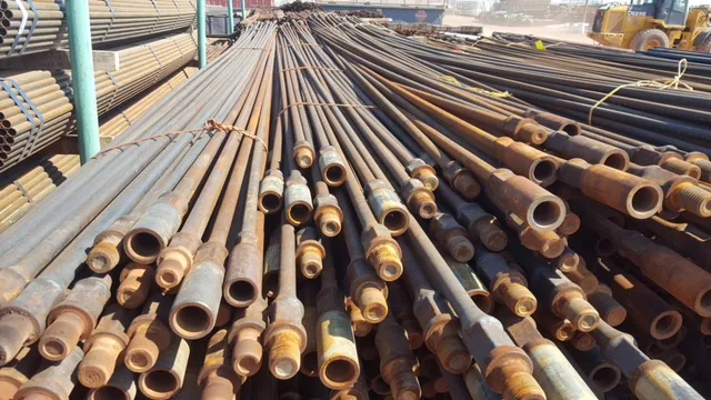 Bundle of used 1 inch steel sucker rod for fencing in Idaho